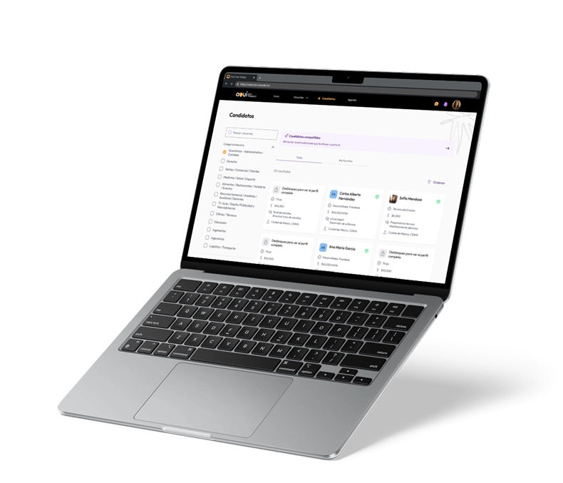 Open laptop displaying a candidates list interface with filters and profile cards on screen.